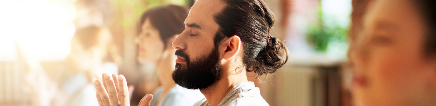 Yoga practitioners showcasing the health benefits of the Sri Sri Yoga Level 2 program